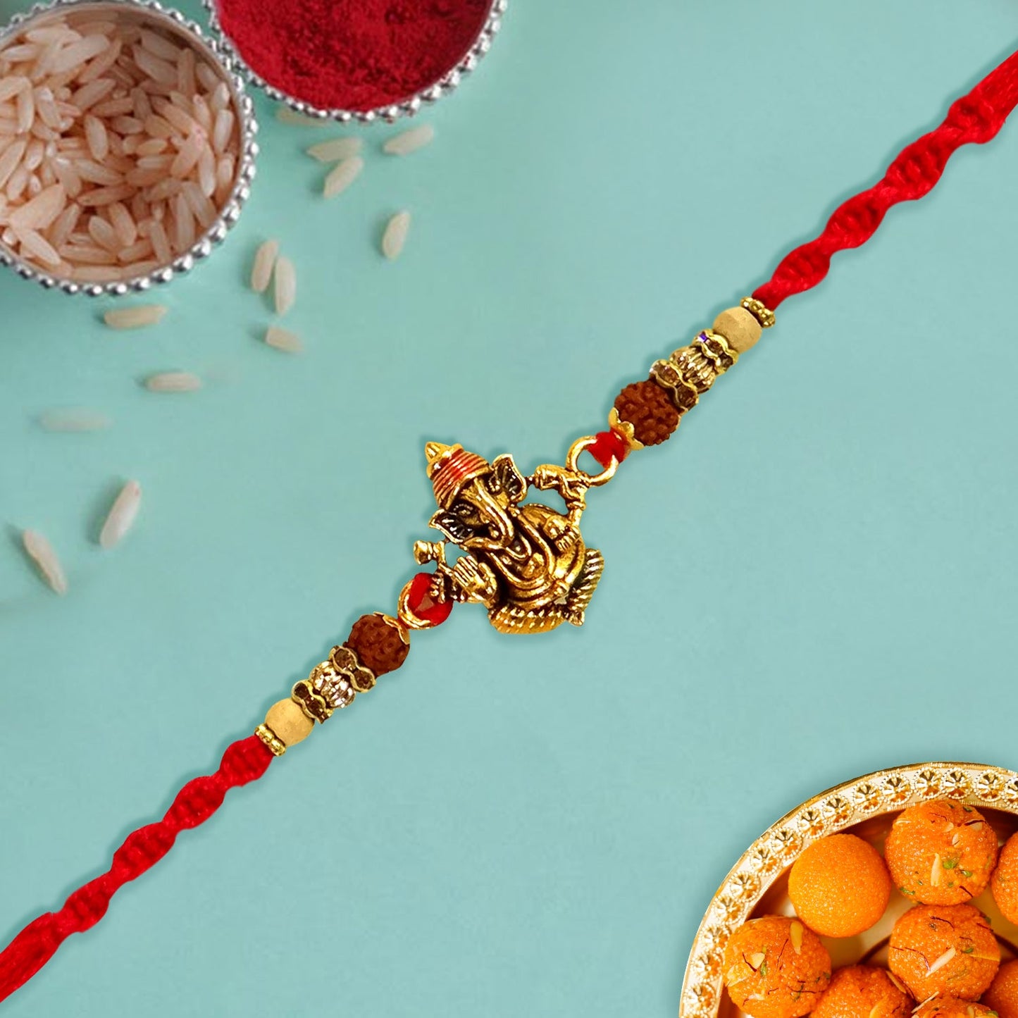 "Ganesh ji with Rudraksha Dora Rakhi By Upharkaro"