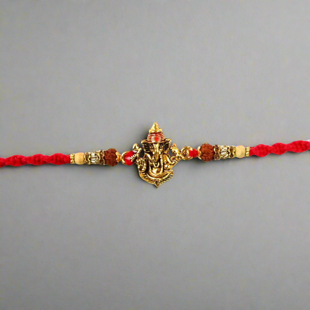 "Ganesh ji with Rudraksha Dora Rakhi By Upharkaro"