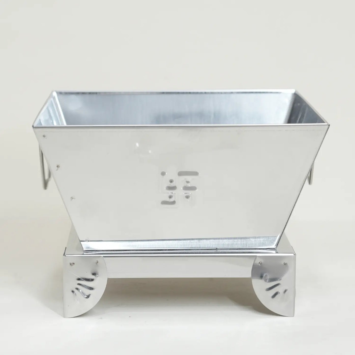 Metal planter box with 'Boma' branding on a white background