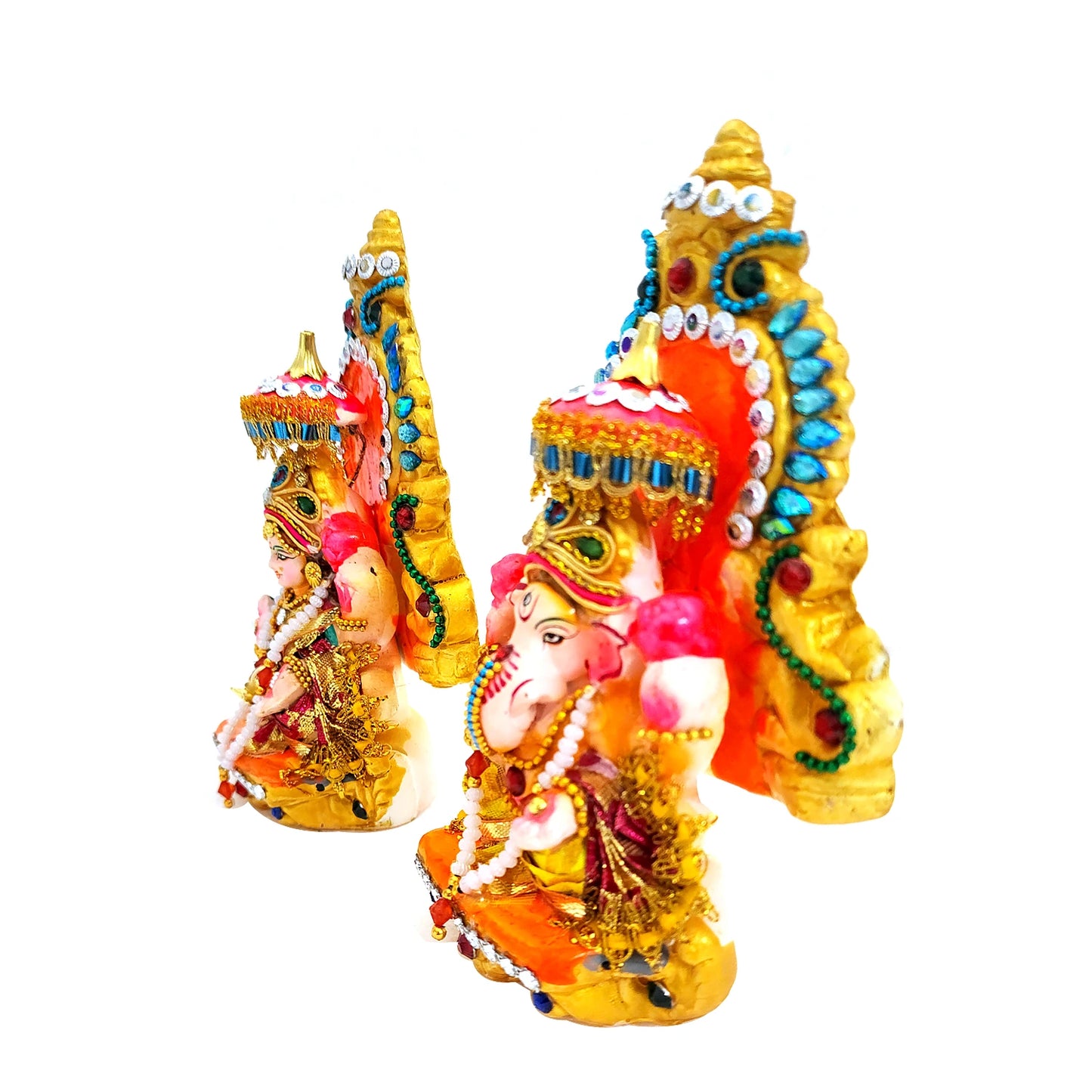 Colorful Ganesh statues with intricate designs on a white background