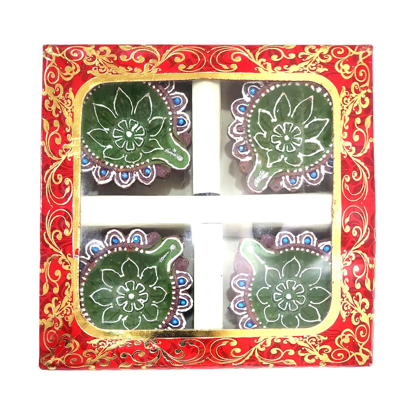 Decorative items in a red and gold box with floral designs.