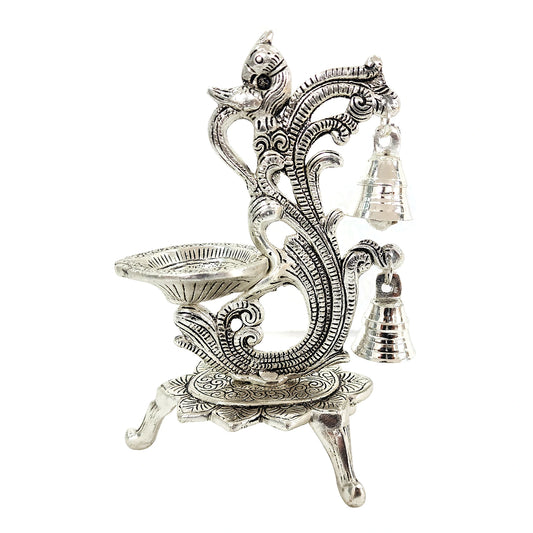 Top angle showing diya placement area on peacock diya stand
