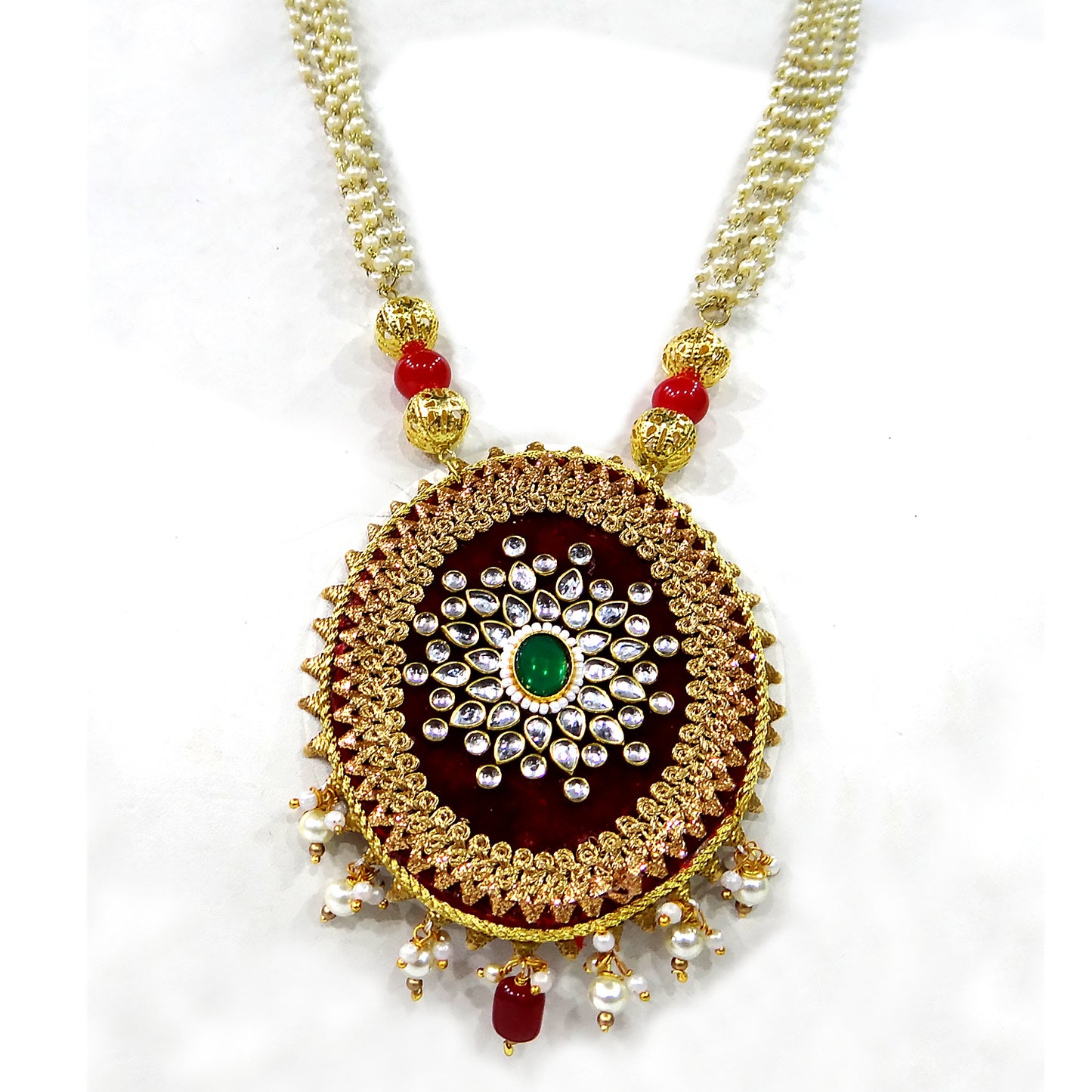 Decorative necklace with gold pendant on a white background