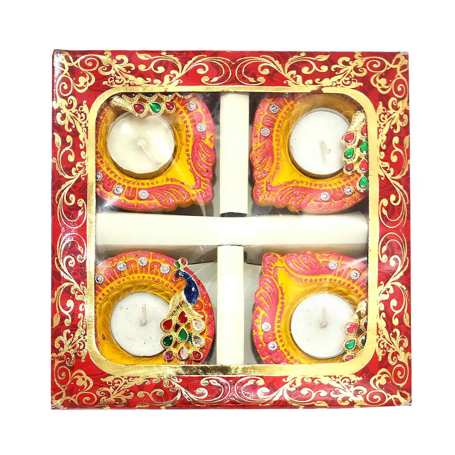 Decorative candles in a box with intricate designs on a red background