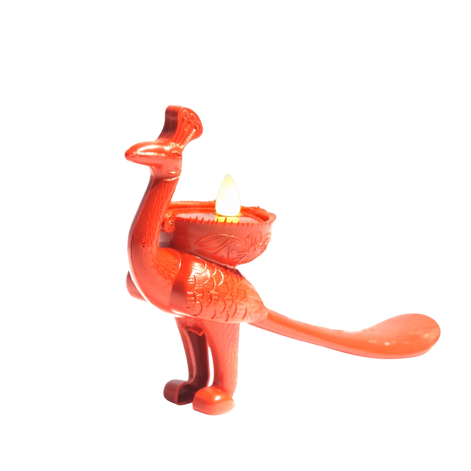 Orange cat-shaped candle holder with a lit candle on a white background
