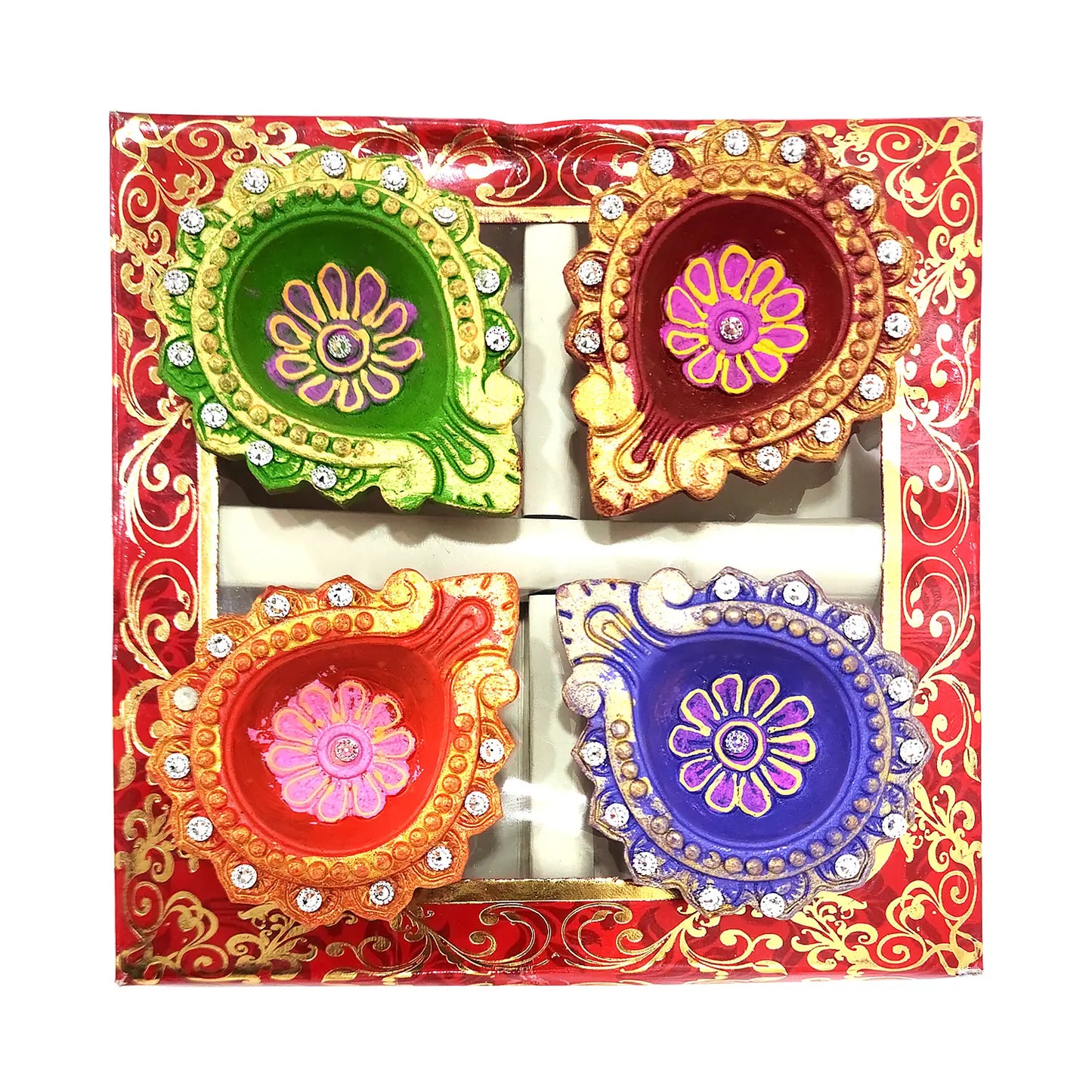 Decorative diya set with colorful designs on a red box