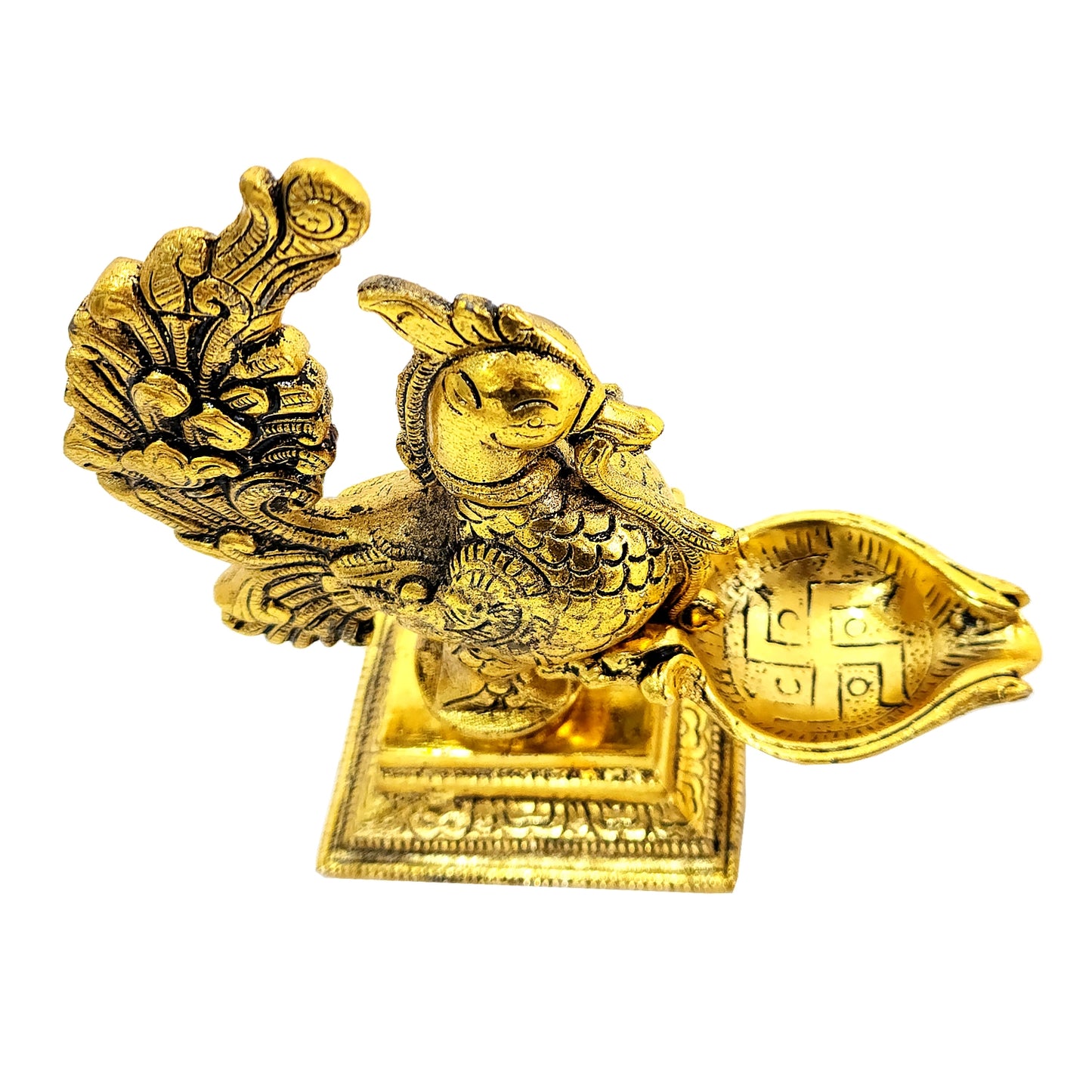 Gold-colored decorative item with bird and shell design on a white background