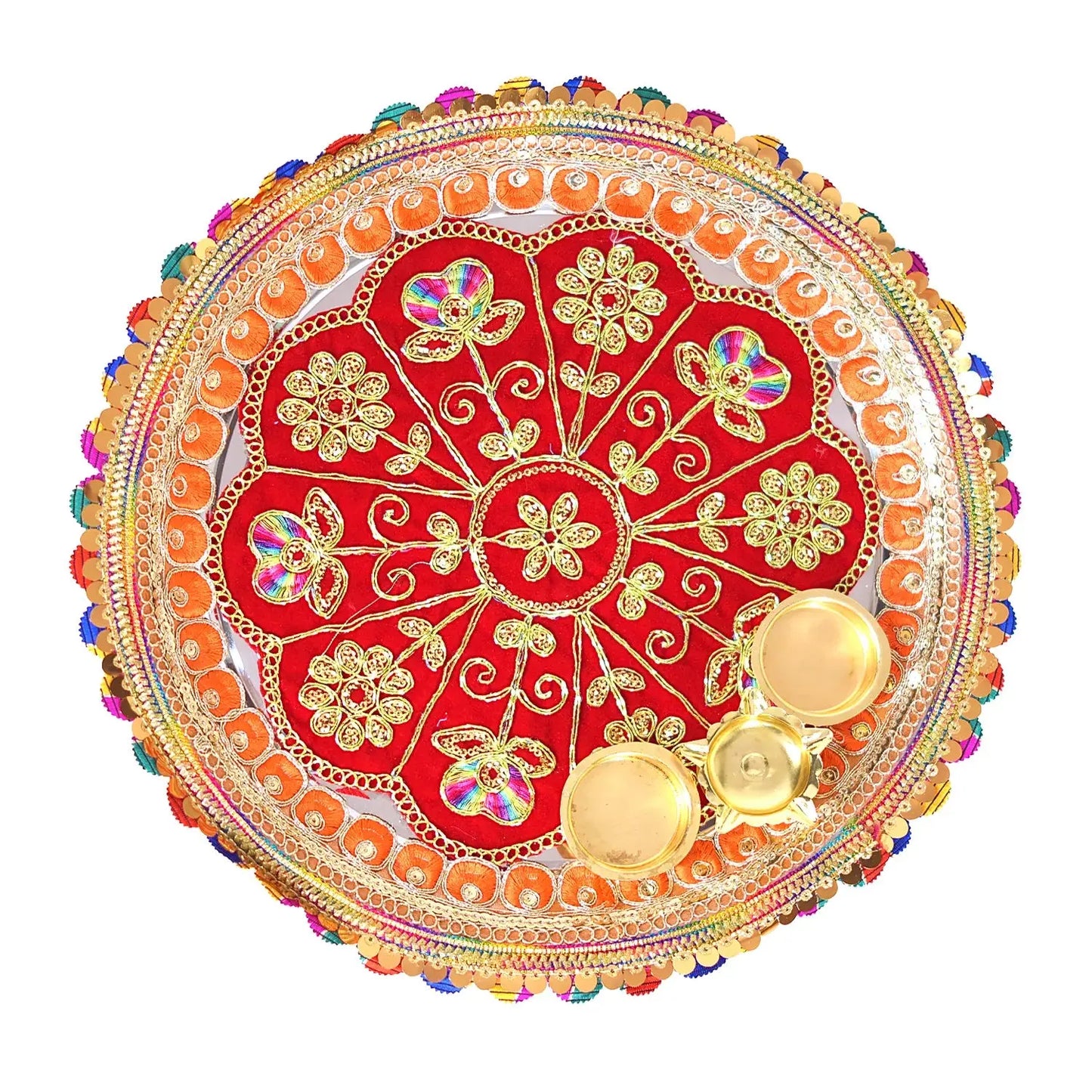 Decorative plate with red center, gold flowers, and colorful beads on a white background