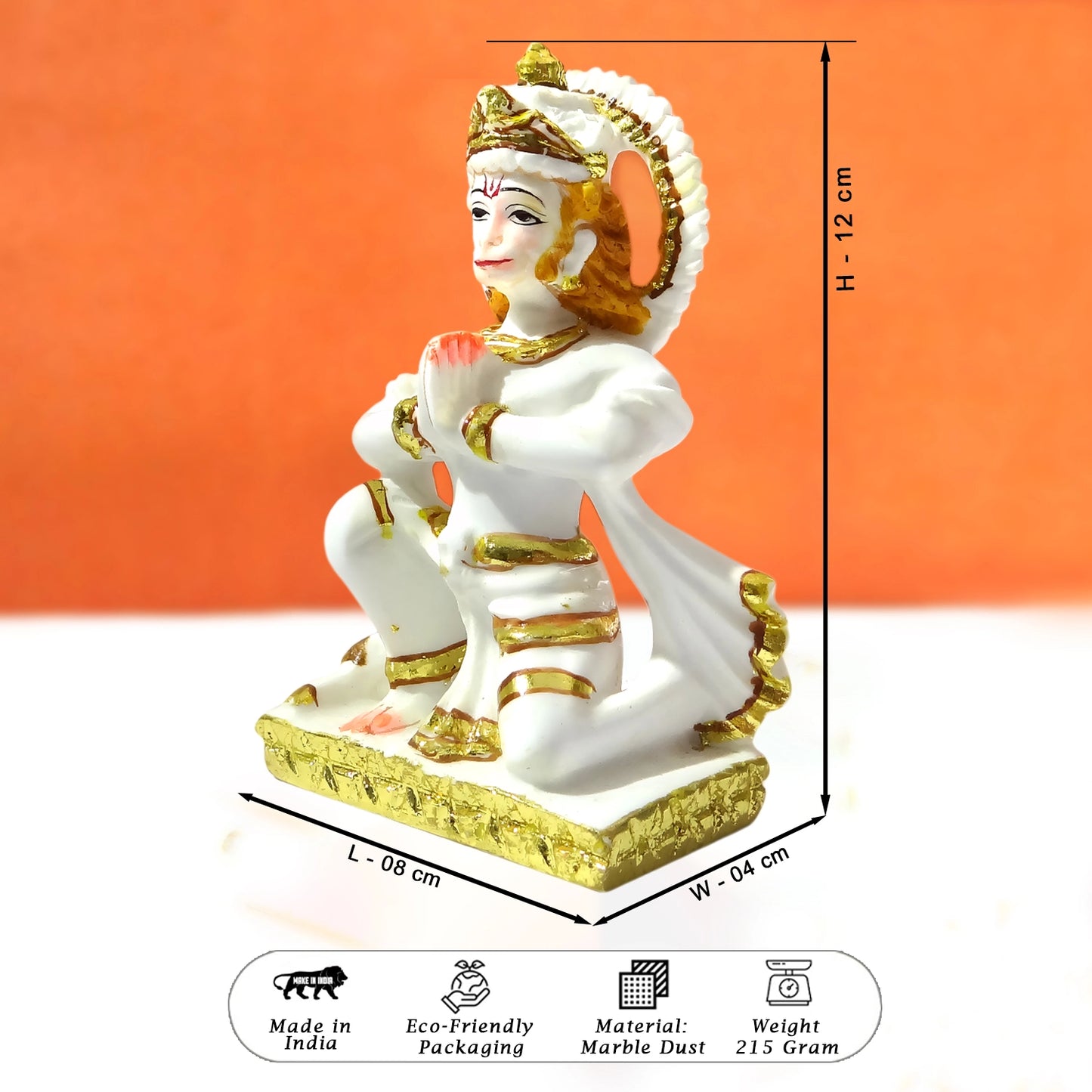 White and gold statue with dimensions on an orange background