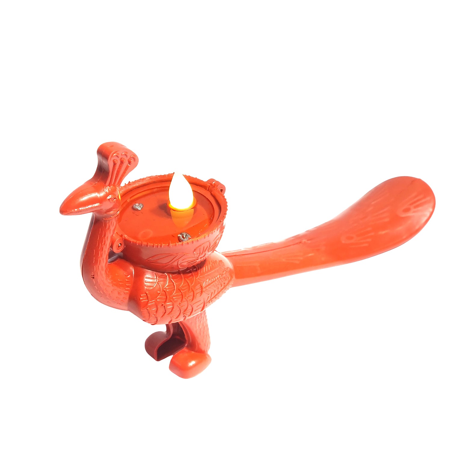Red bird-shaped oil lamp with a lit candle on a white background
