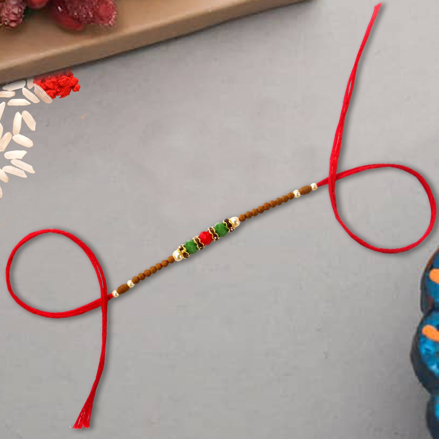 Designer Multi-Colour Pearl Rakhi for Brother – Elegant, Unique & Stylish Raksha Bandhan Gift | Upharkaro-Upharkaro