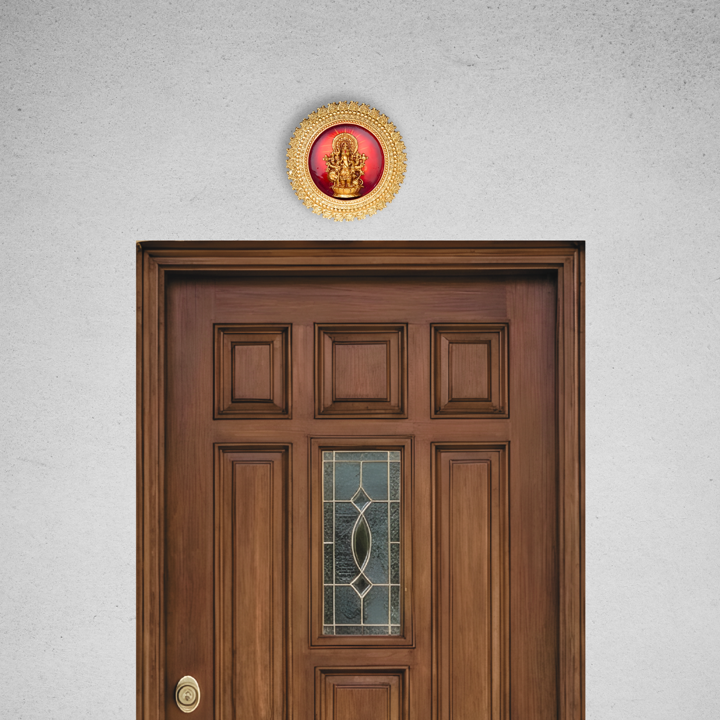 Wooden door with decorative wall art above it on a light gray wall.
