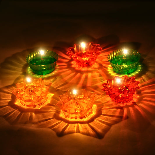 Colorful water sensor diya lamps with  led bulb on a dark background
