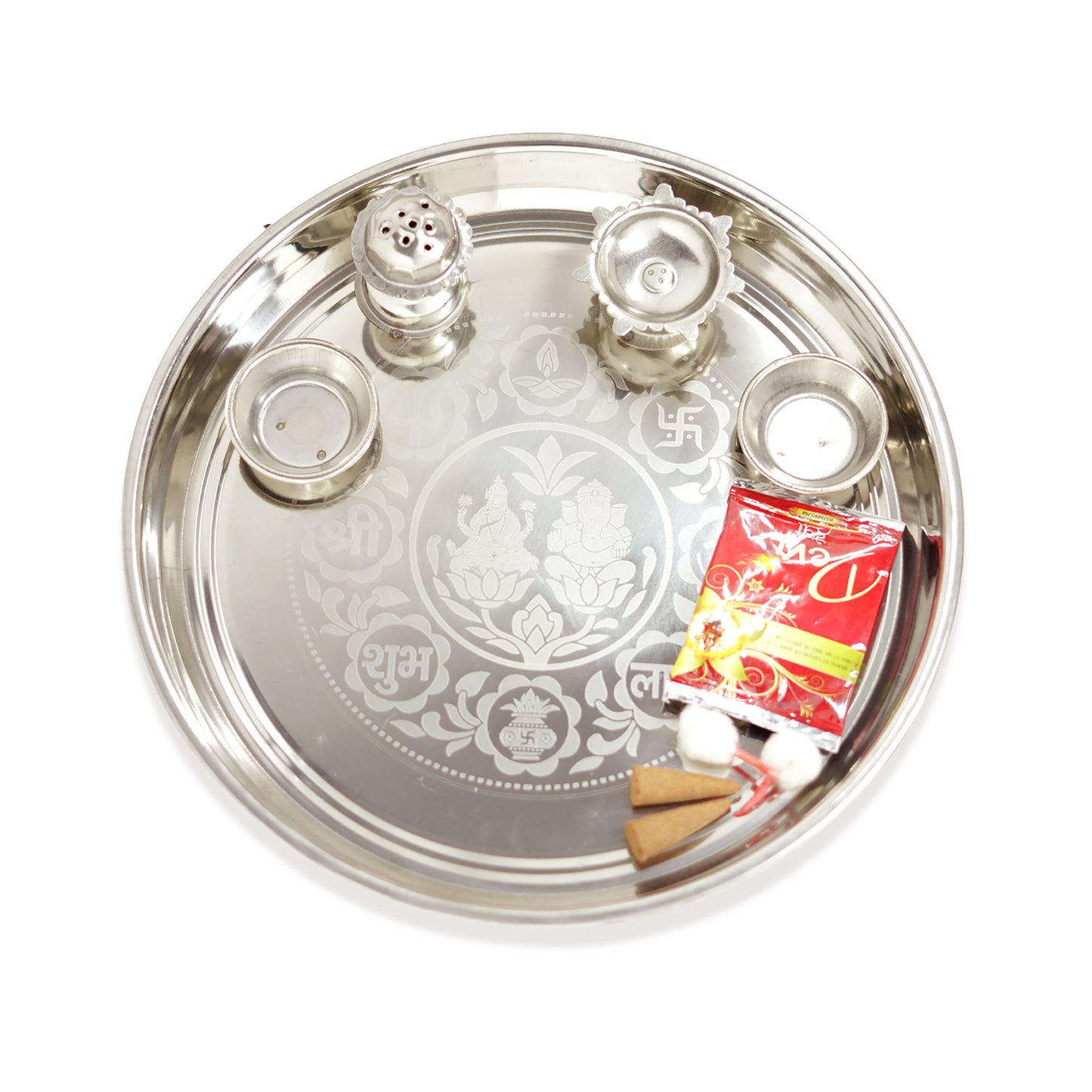 Silver tray with decorative patterns, salt and pepper shakers, and a red packet on a white background