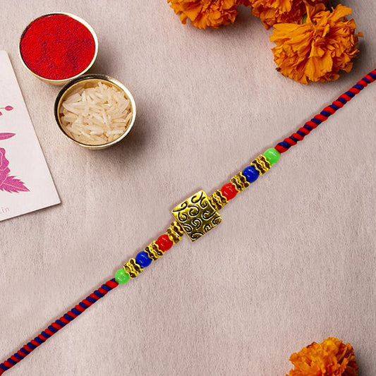 Gold Plated Multi-Colour Dora Rakhi for Brother – Traditional Rakhi with Stylish Thread Design, Elegant Beads & Festival Vibes | Upharkaro Rakhi 2024 Collection