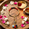 Vibrant Peacock Charm Bracelet-Style Lumba Rakhi