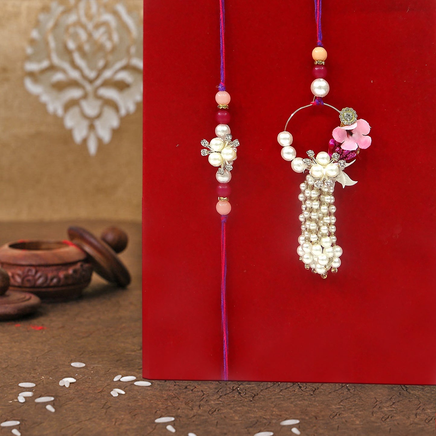 Elegant Pearl Floral Bhaiya Bhabhi Lumba Rakhi Set with Tassel & Pink Crystal Design