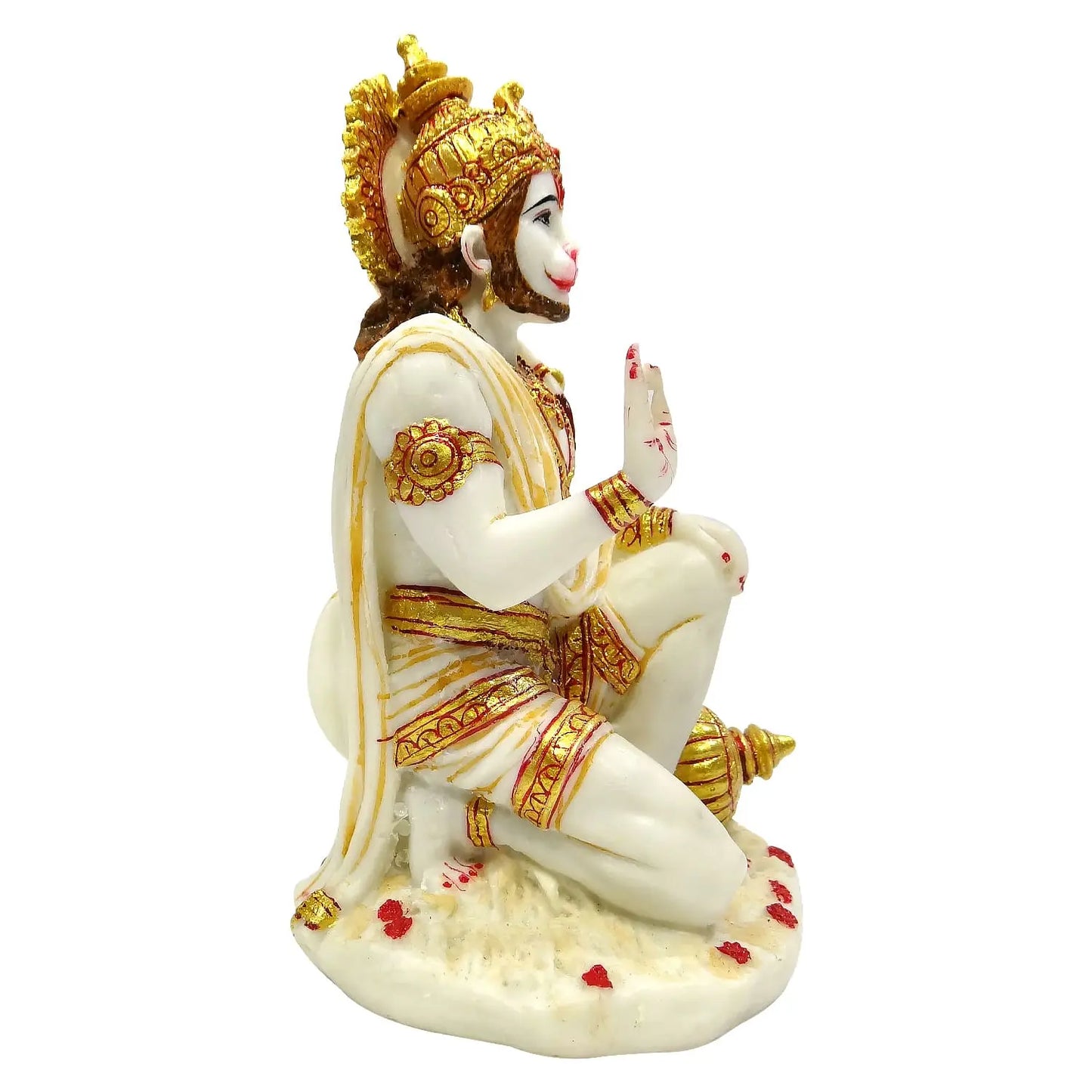 Statue of a deity in white and gold attire on a white background