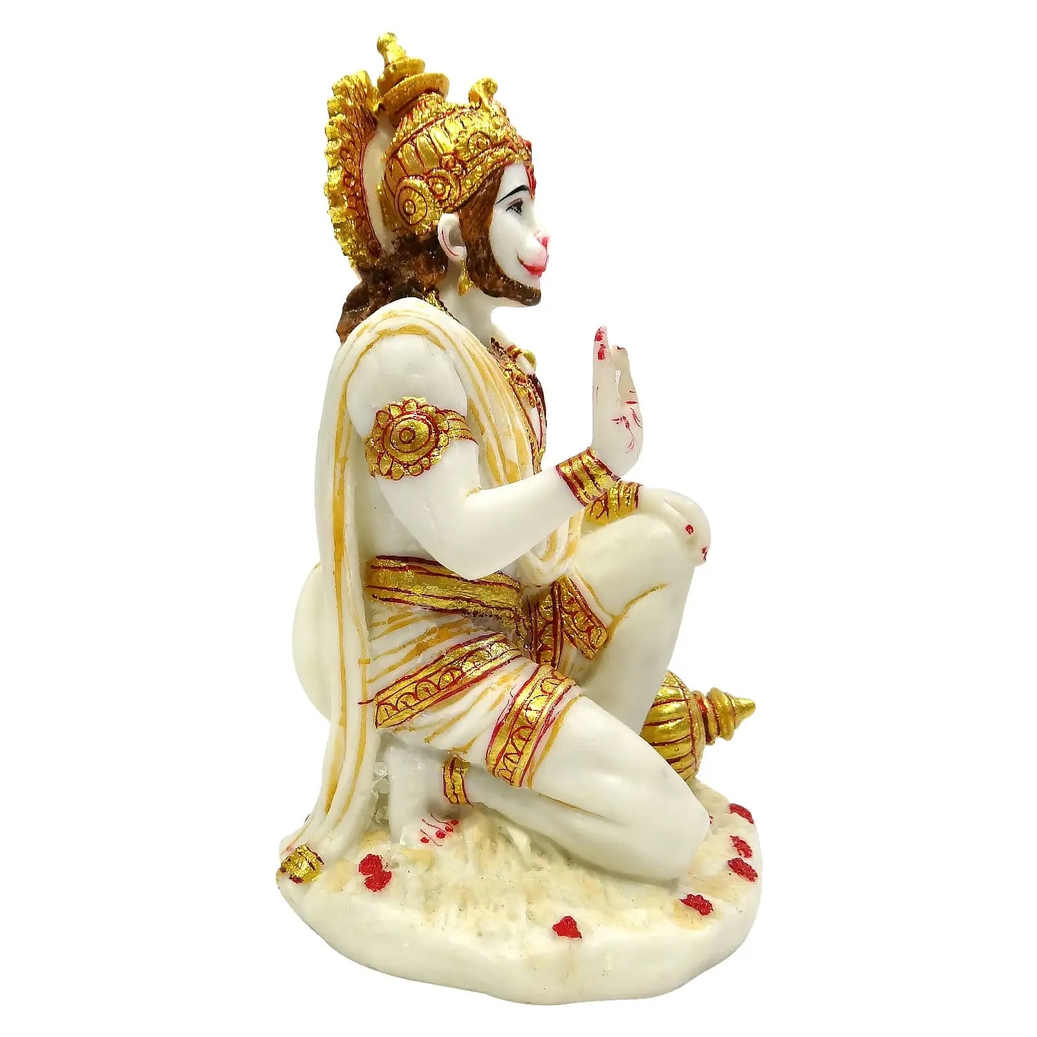 Statue of a deity in white and gold attire on a white background