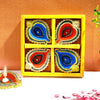 Brighten up your festive celebrations with the Elegant Decorative Clay Diya Set by Upharkaro