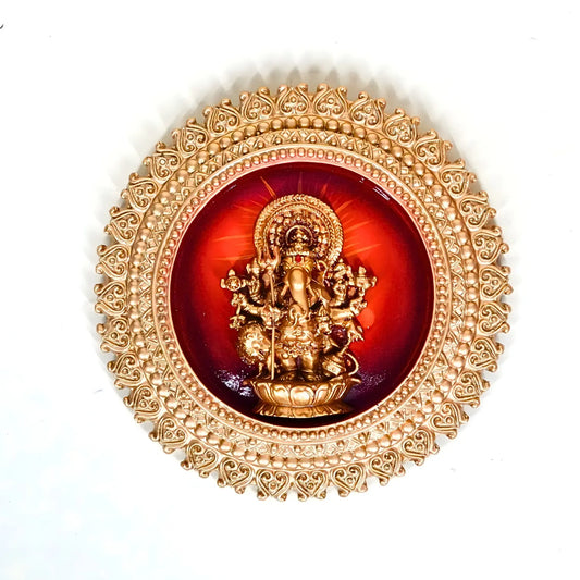 Bring home divine positivity and auspicious blessings with the Upharkaro Golden Round Shubha Drishti Ganapathy Wall Hanging (7 x 7 Inch). Beautifully crafted with a radiant golden finish and an intricate circular design, this spiritual wall décor features Lord Ganesha in Shubha Drishti posture, symbolizing wisdom, prosperity, protection, and the removal of obstacles. Designed to enhance the spiritual ambience of your home, office, pooja room, temple, or entrance wall, this elegant Ganesha wall hanging is be