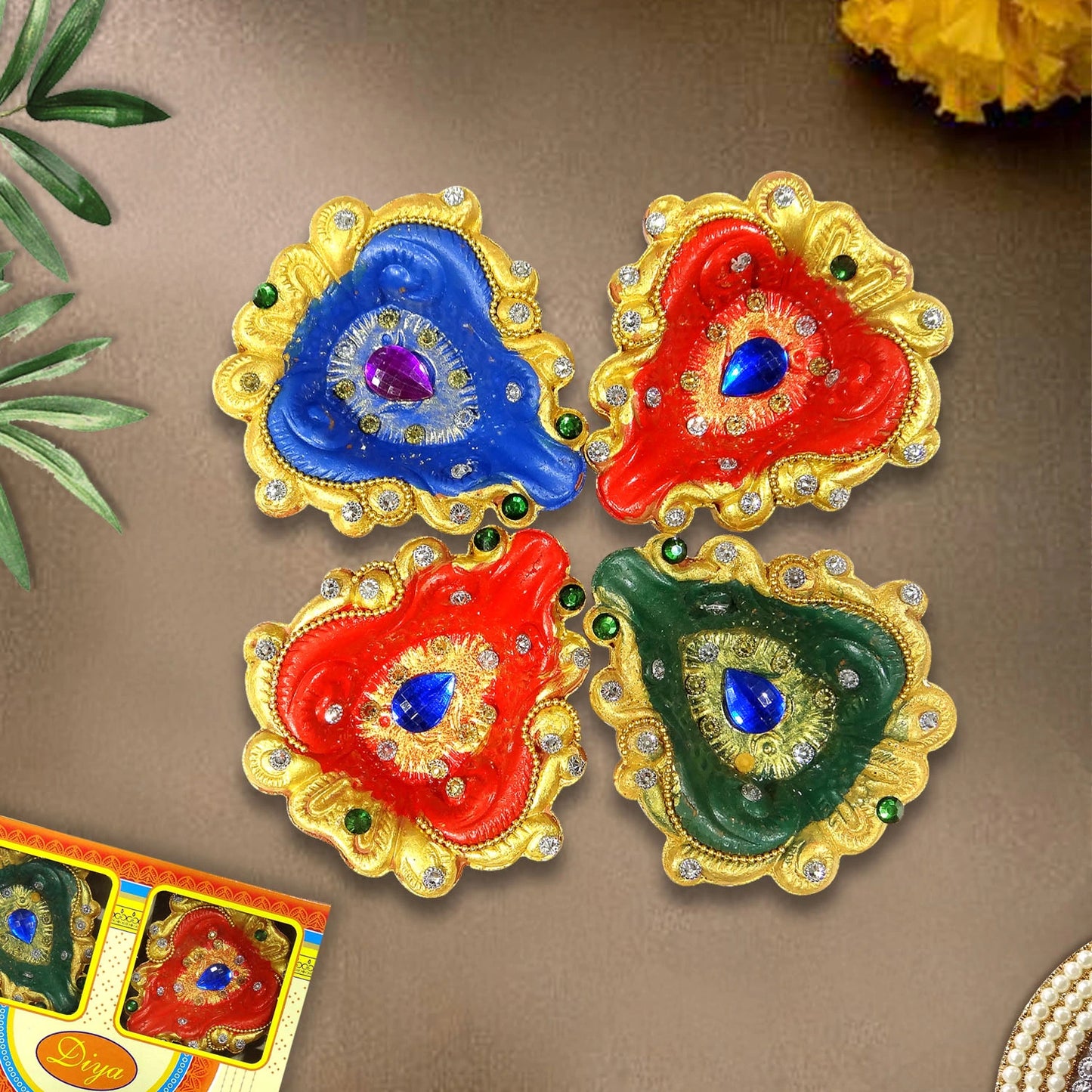 Colorful decorative items with gold borders on a brown background