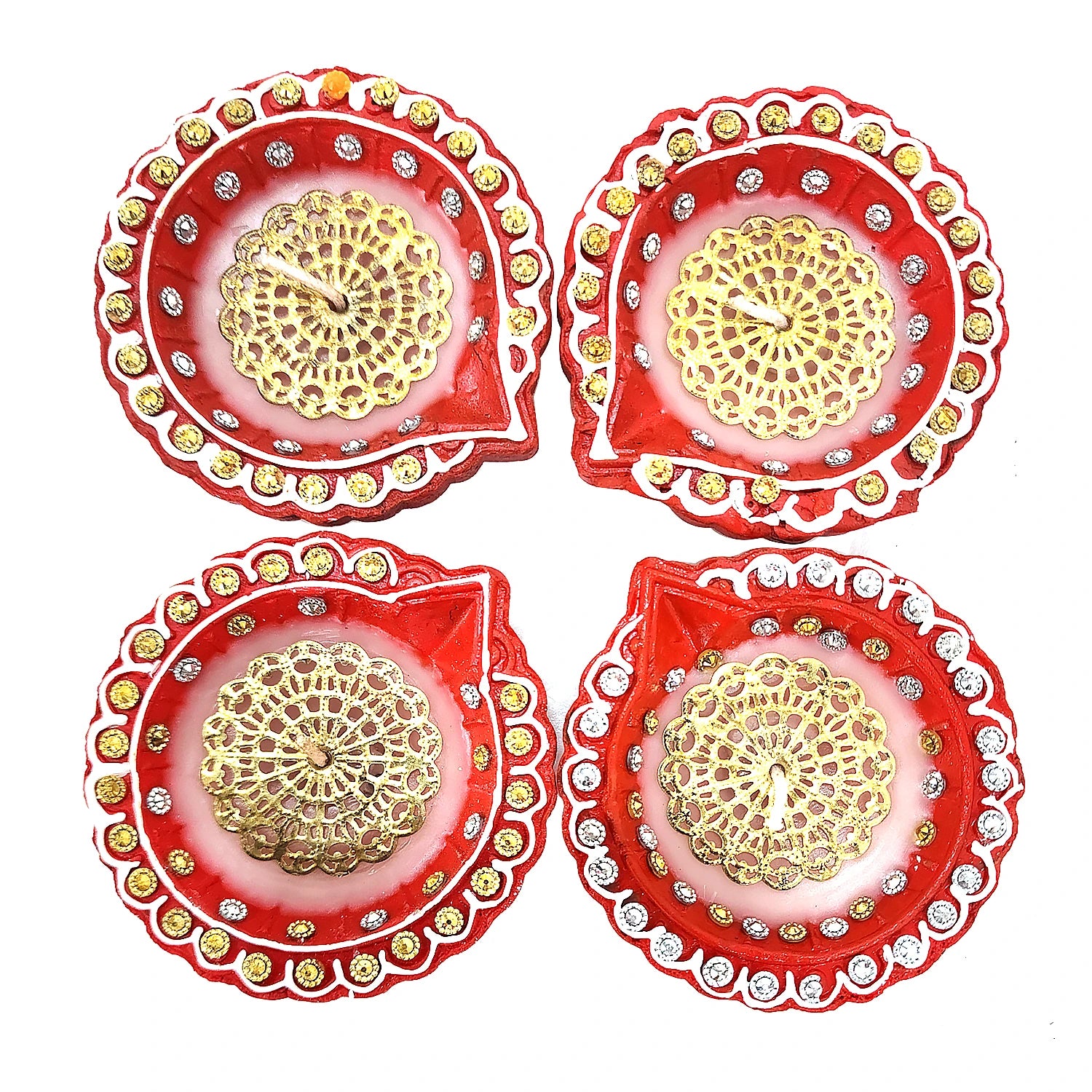 Four red and gold decorative items with intricate patterns on a white background