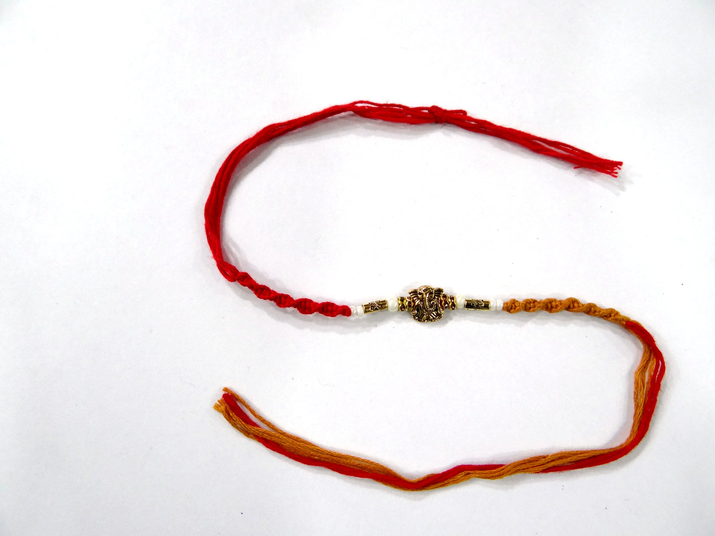 Divine Lord Ganesha Gold-Toned Rakhi for Brother with Beads