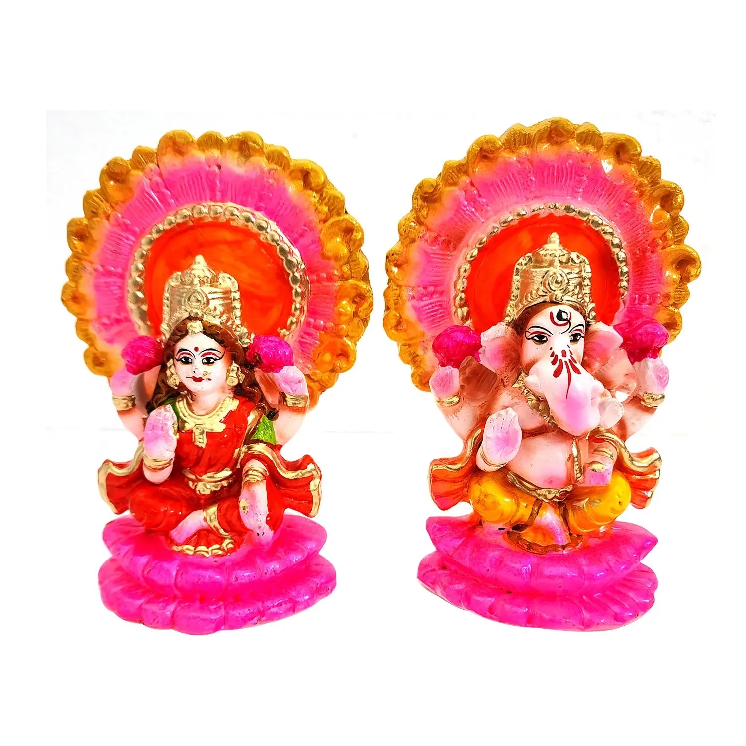 Two colorful figurines with pink and gold accents on a white background