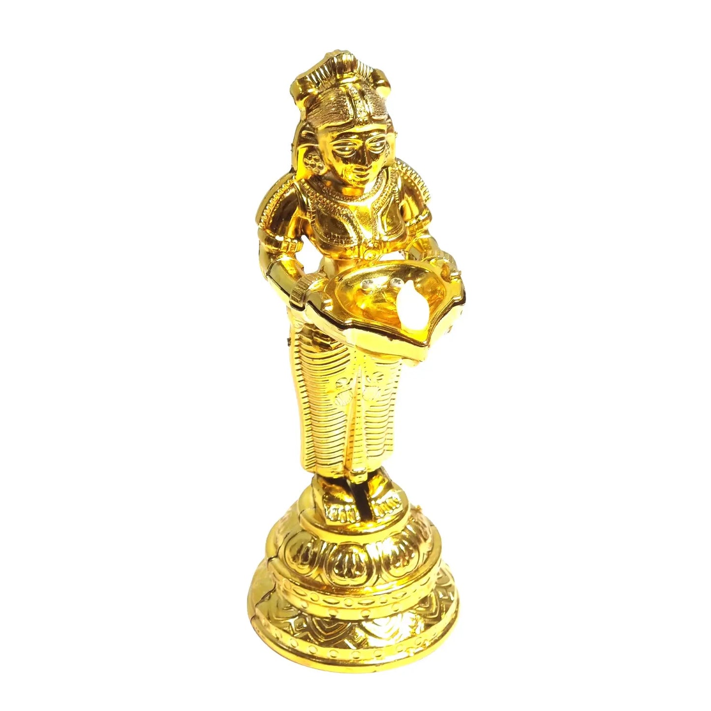 Gold-colored statue of a person holding a lamp on a white background