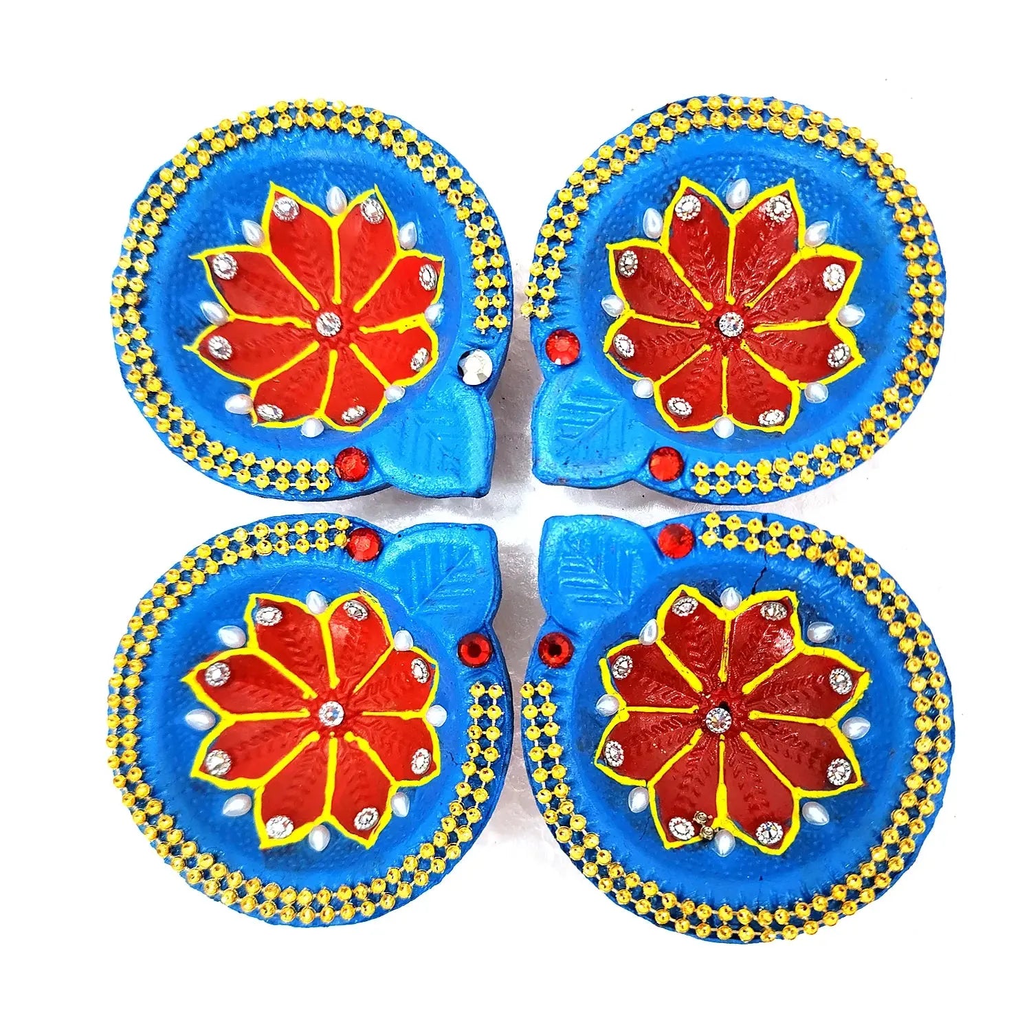 Four decorative items with blue backgrounds and red floral designs on a white background