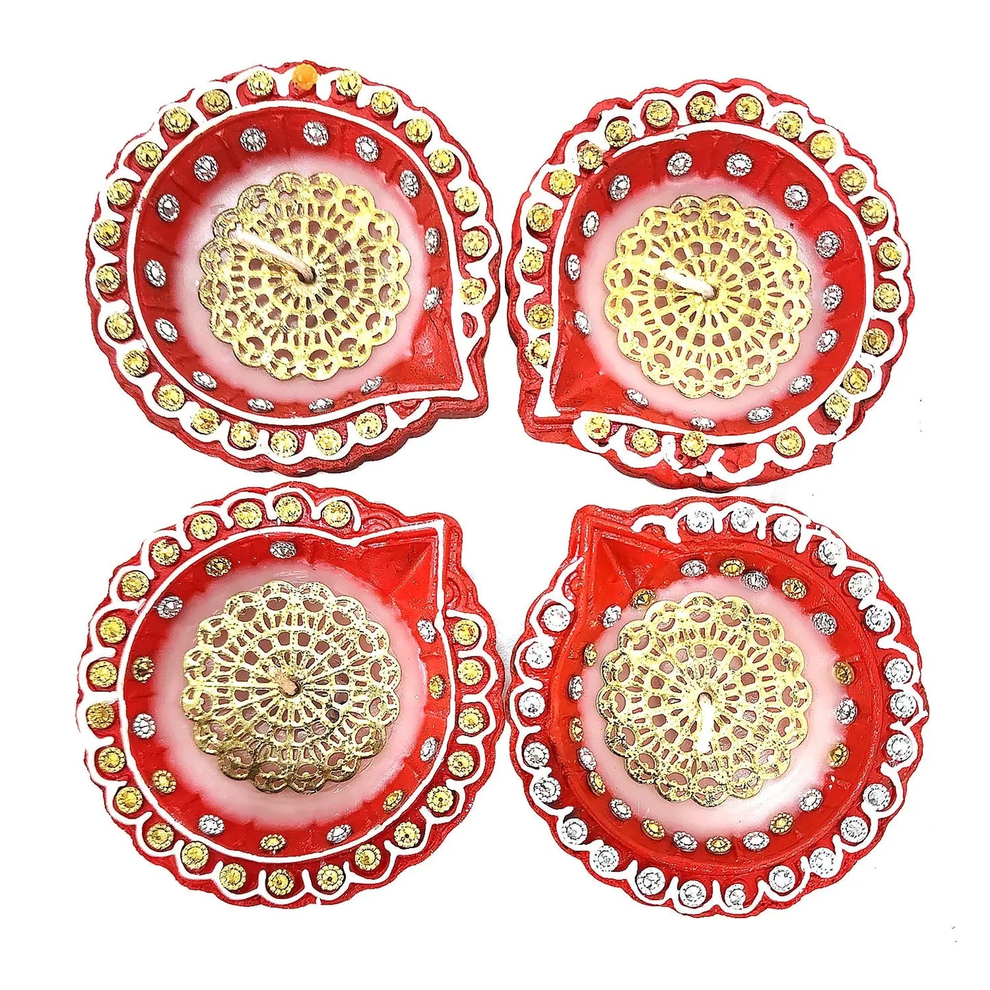 Four red and gold decorative items with intricate patterns on a white background