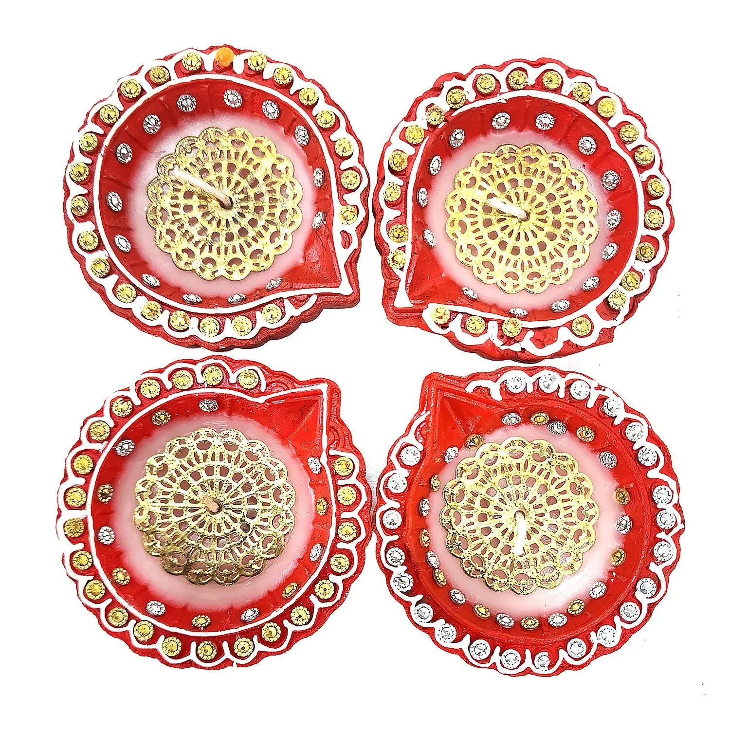 Four red and gold decorative items with intricate patterns on a white background