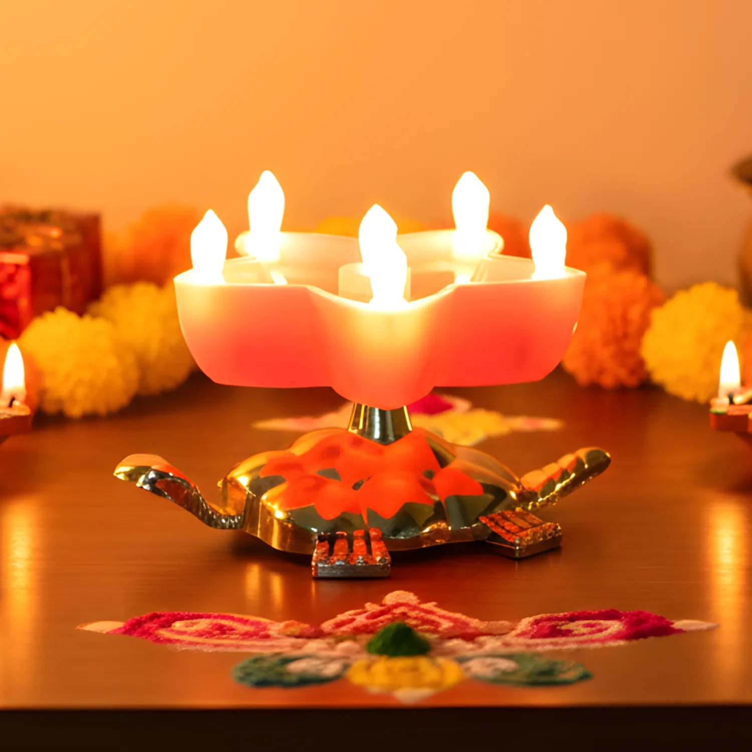 Decorative lamp with lit candles on a wooden surface, surrounded by festive decorations.