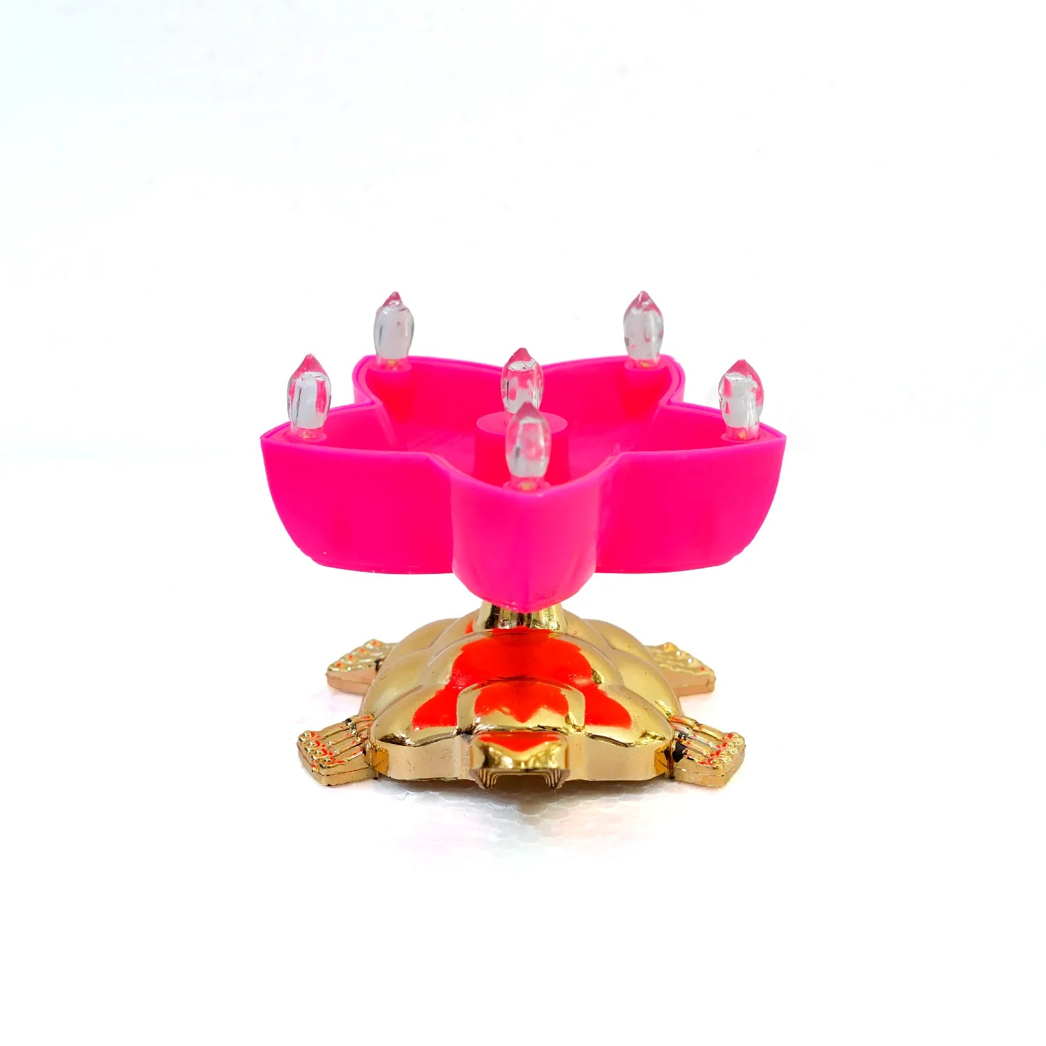 Pink candle holder with gold base on a white background