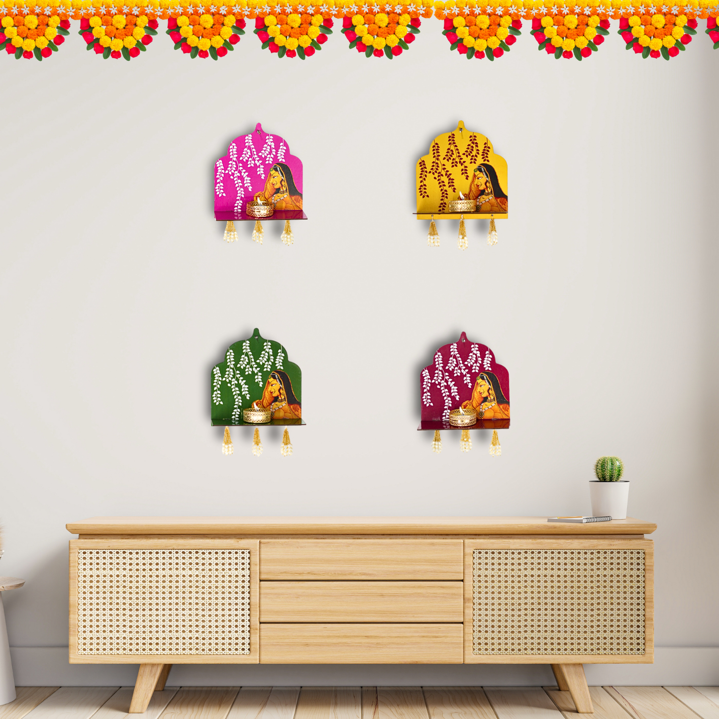Decorative wall hangings with colorful designs on a white wall above a wooden cabinet.
