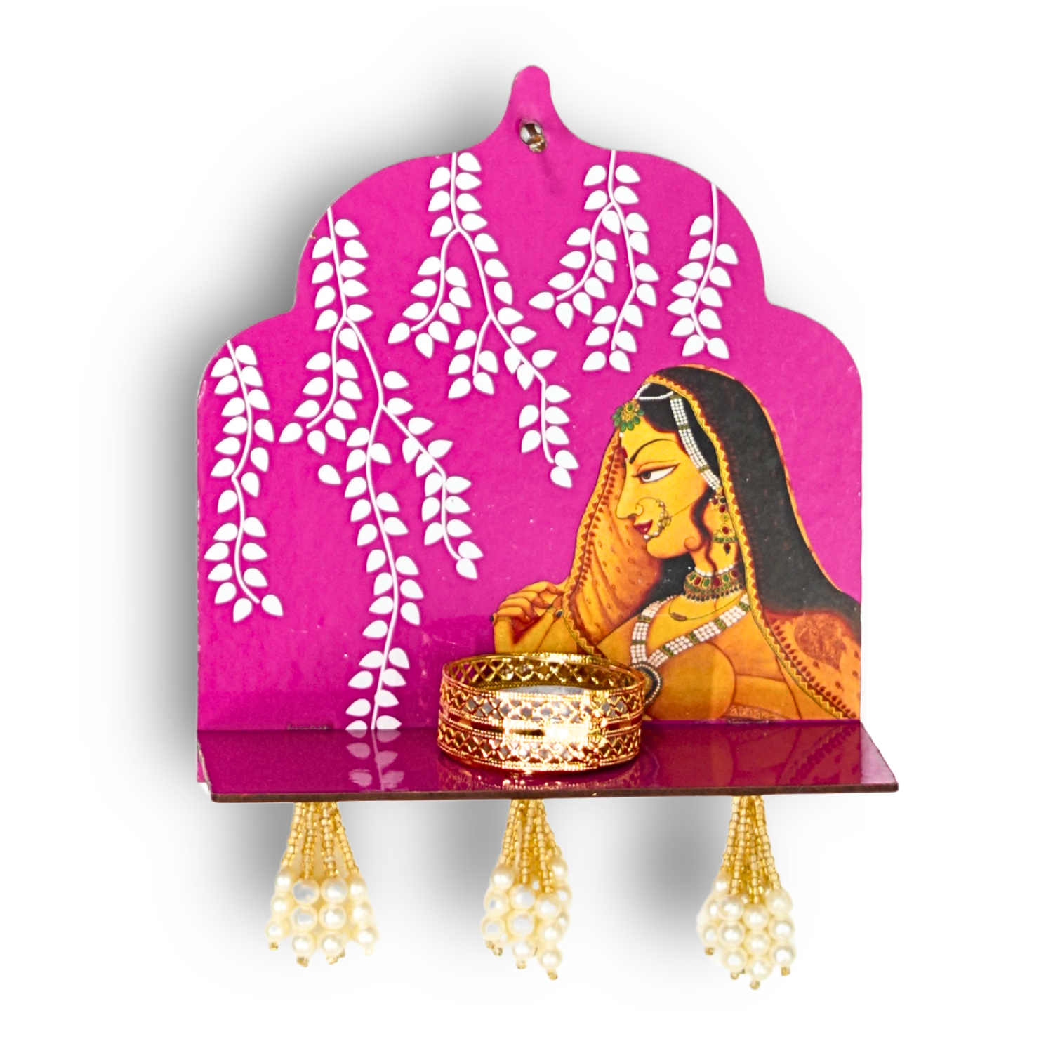 Decorative wall shelf with a pink background, white leaves, and a woman's portrait with gold jewelry.