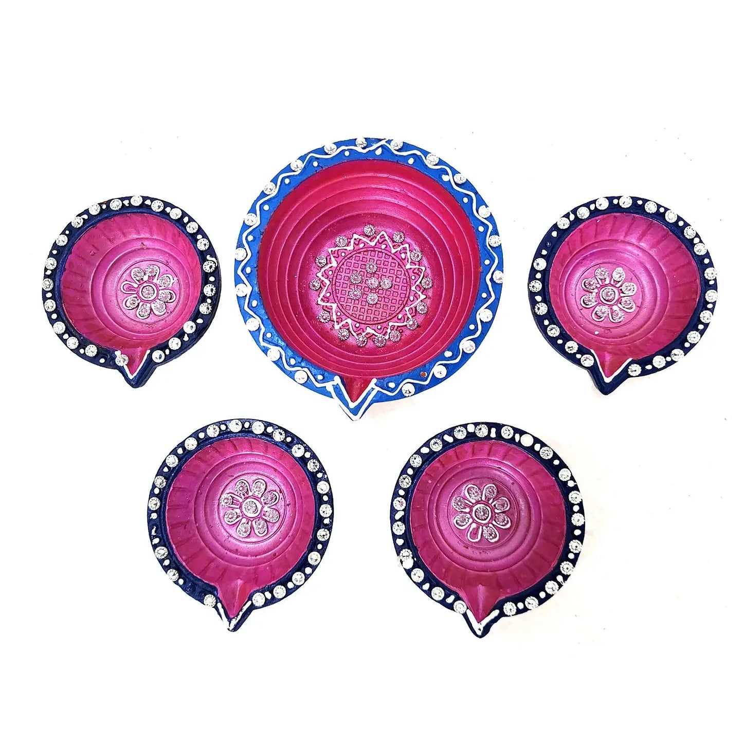 Set of five pink and blue decorative plates with intricate patterns on a white background