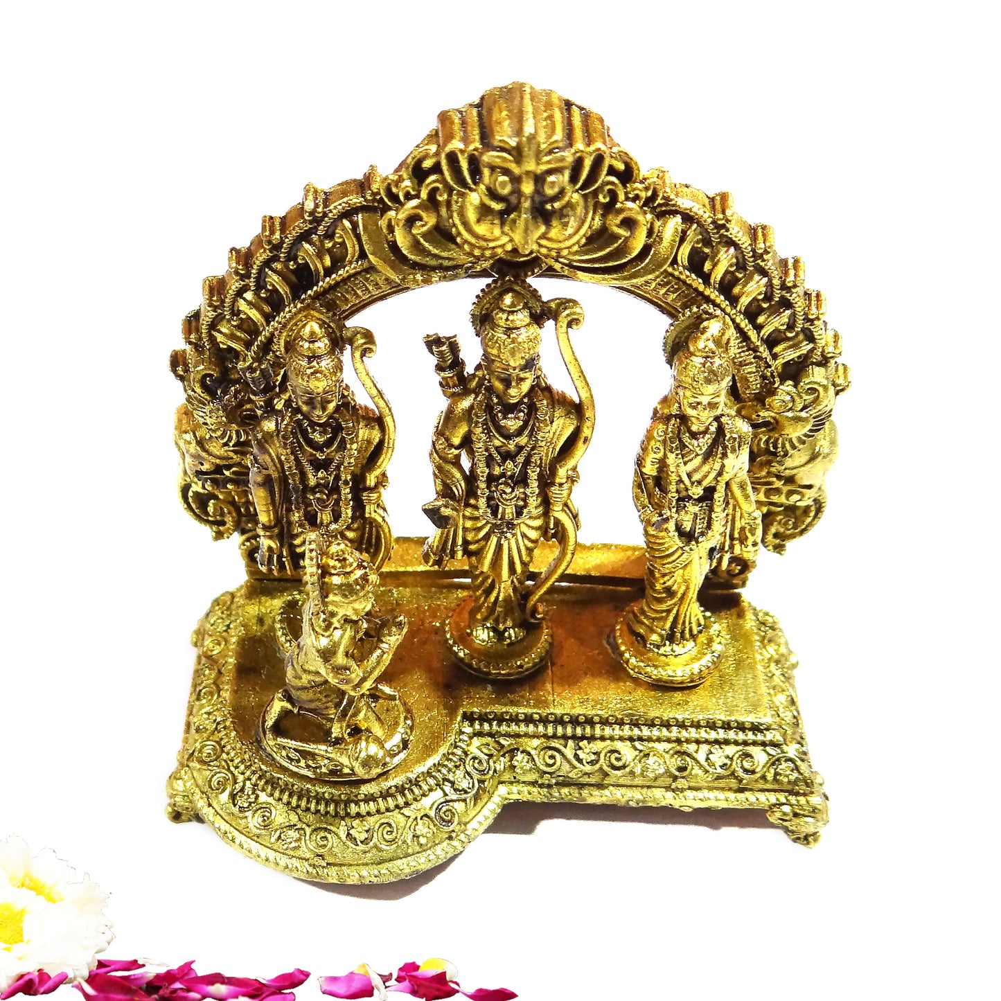 Decorative gold statue with multiple figures on a white background