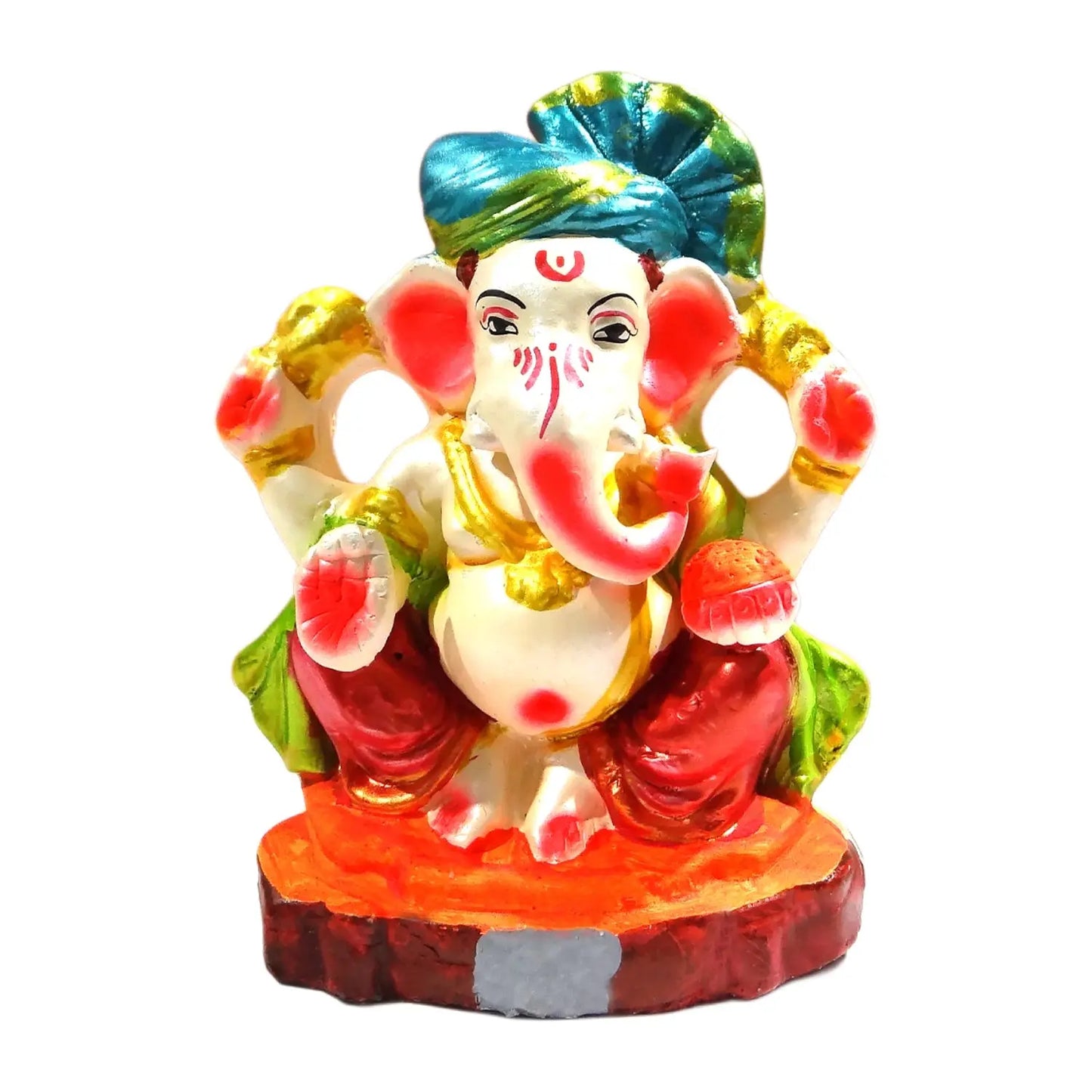 Colorful statue of a deity with a turban on a white background