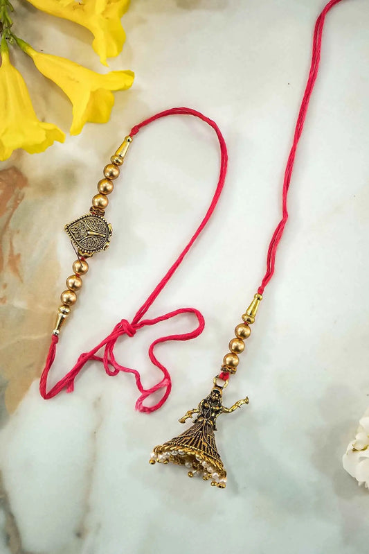 Elegant Dolls & Pearl Hanging Lumba Rakhi for Bhabhi – Traditional Rakhi Design by Upharkaro-Upharkaro