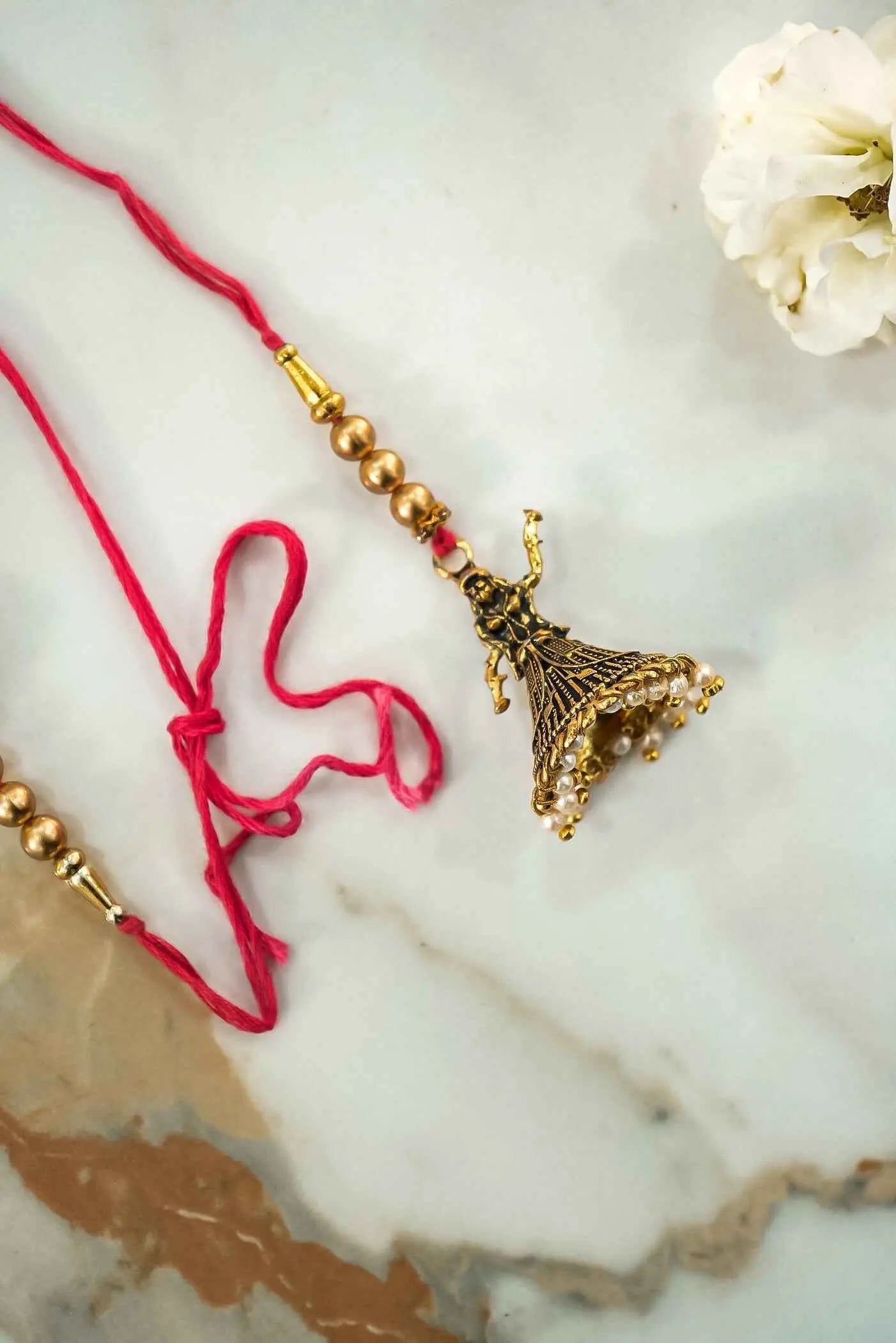 Elegant Dolls & Pearl Hanging Lumba Rakhi for Bhabhi – Traditional Rakhi Design by Upharkaro-Upharkaro