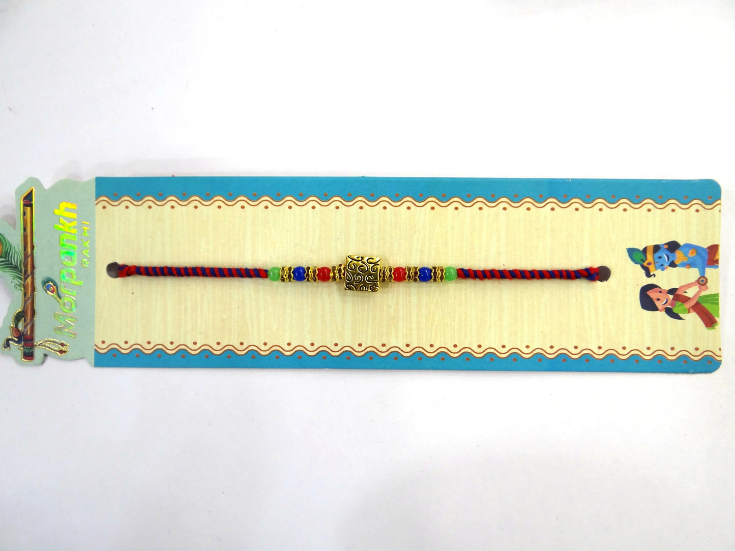 Gold Plated Multi-Colour Dora Rakhi for Brother – Traditional Rakhi with Stylish Thread Design, Elegant Beads & Festival Vibes | Upharkaro Rakhi 2024 Collection-Upharkaro