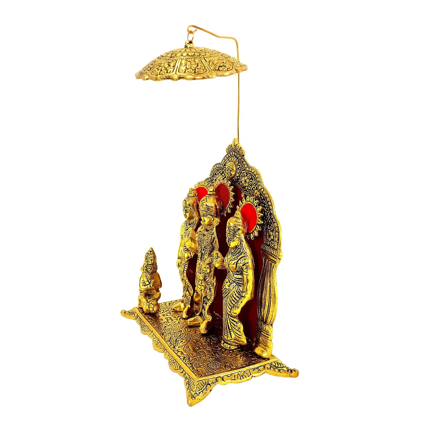 Decorative gold figurine with intricate designs on a white background