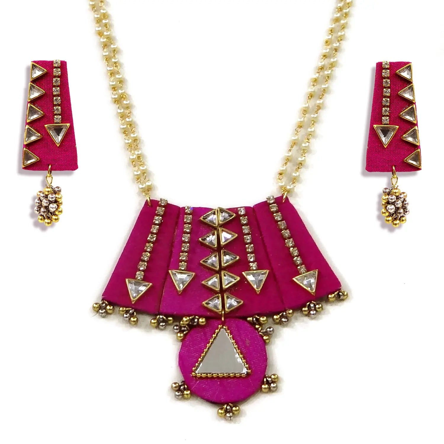 Pink necklace with gold accents and matching earrings on a white background