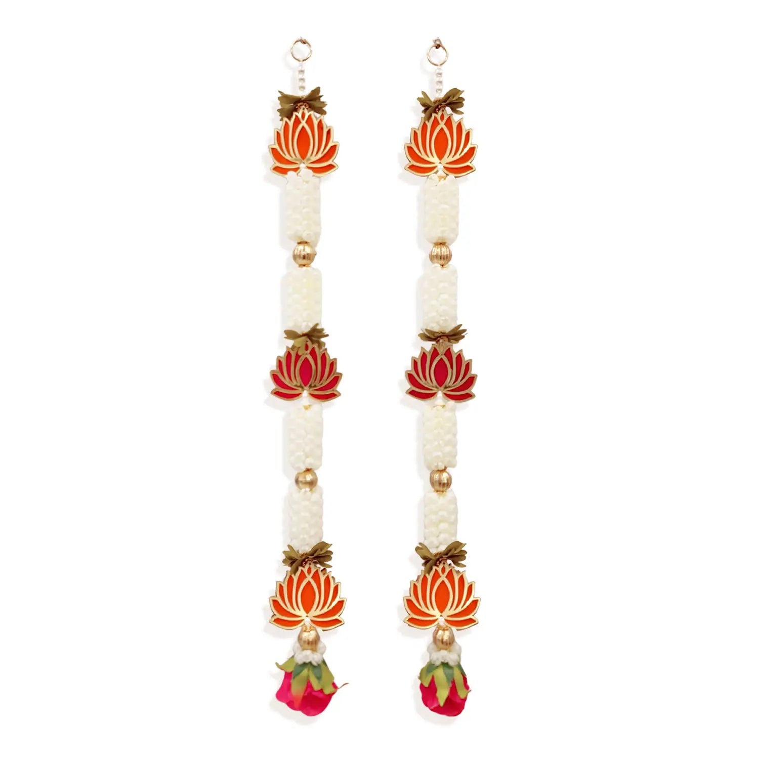 Pair of earrings with floral designs on a white background