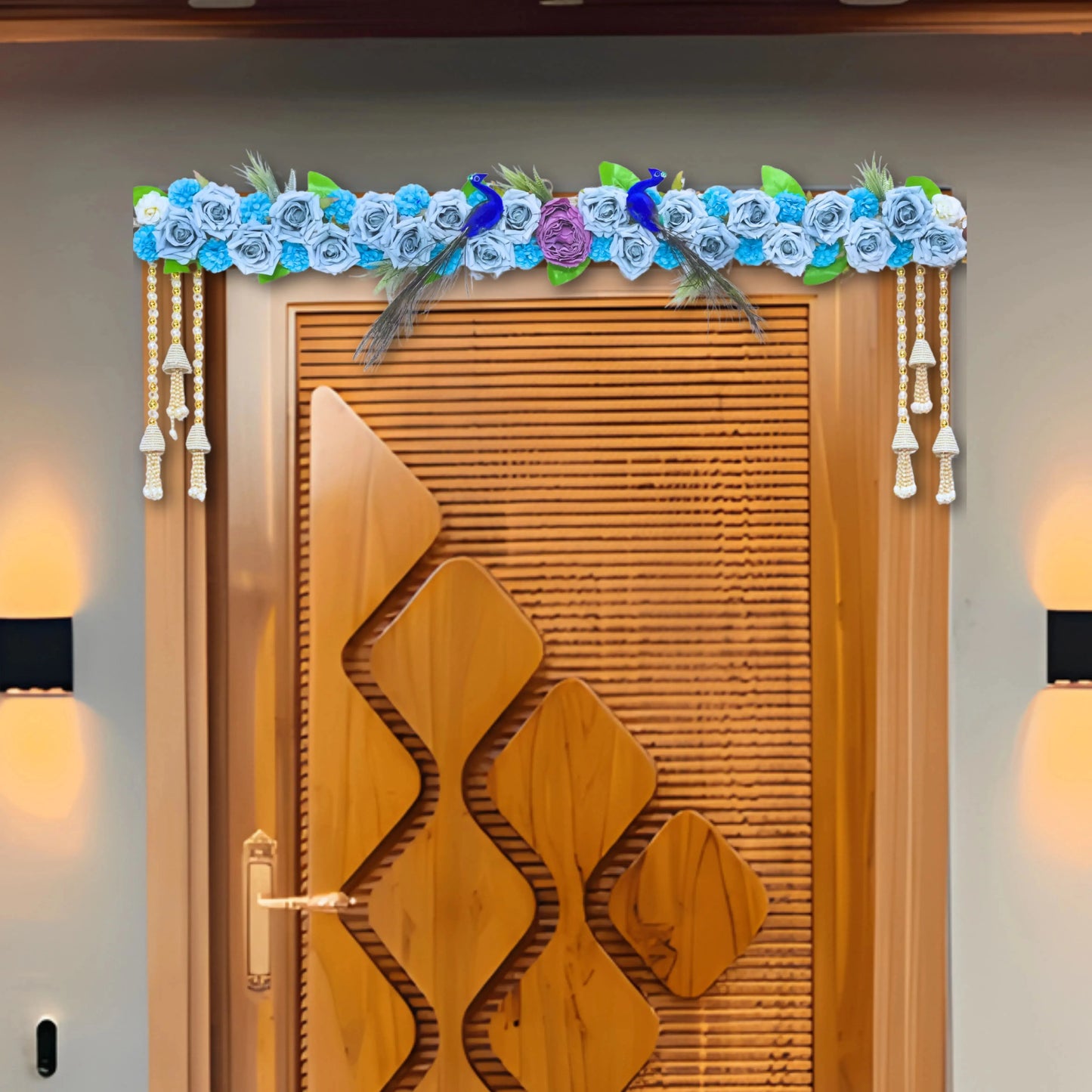 Decorative wooden door with floral arch and lights on a gray wall