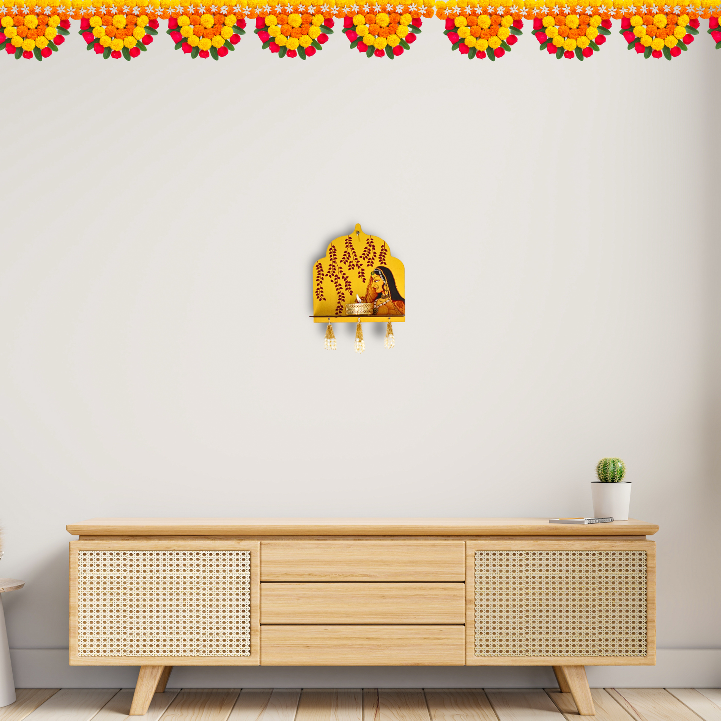 Wooden cabinet with decorative wall art on a white wall