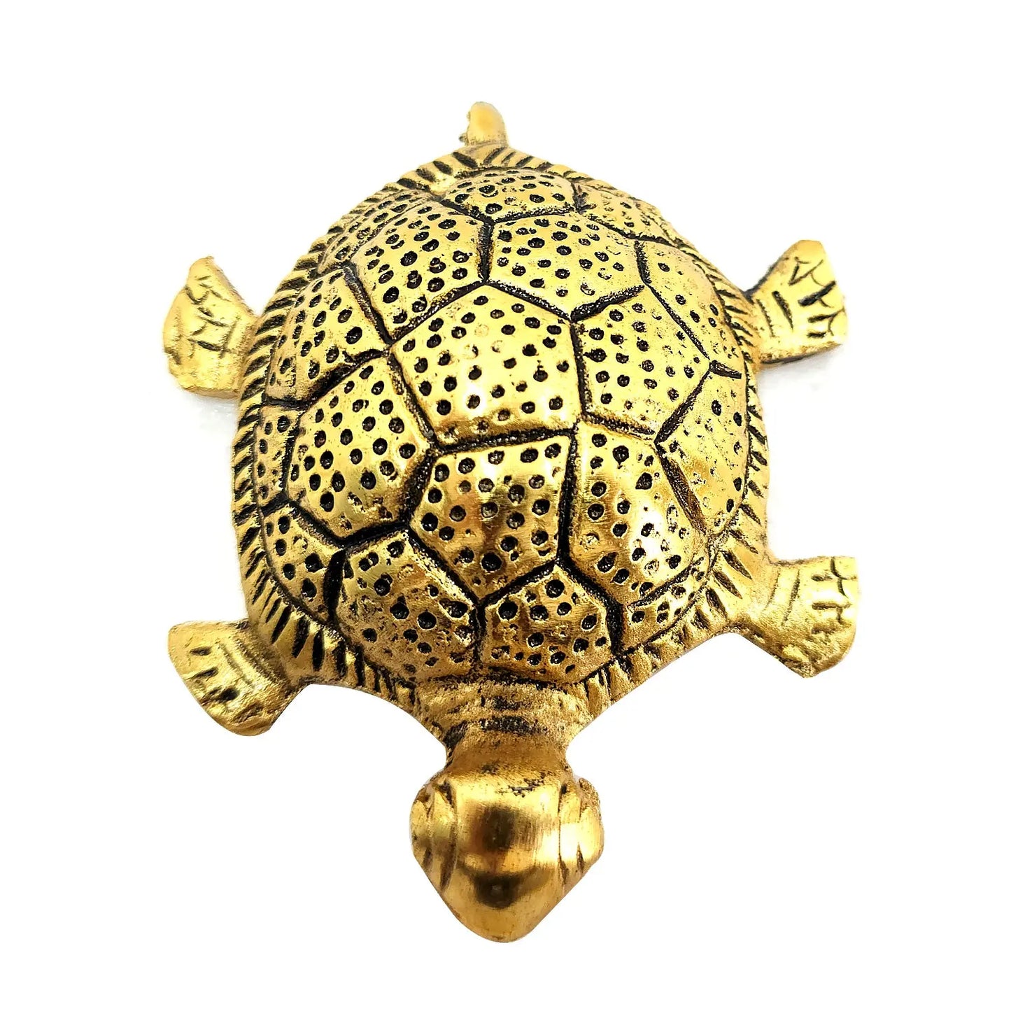 Gold turtle figurine on a white background