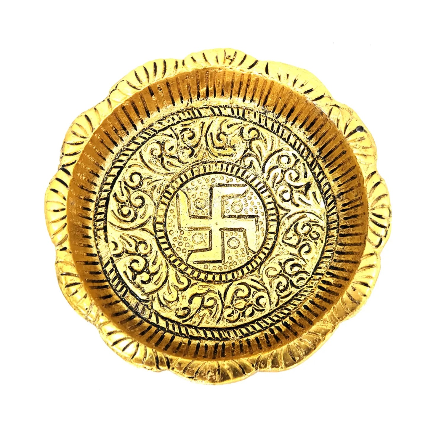 Gold decorative plate with intricate patterns and a central swastika symbol on a white background